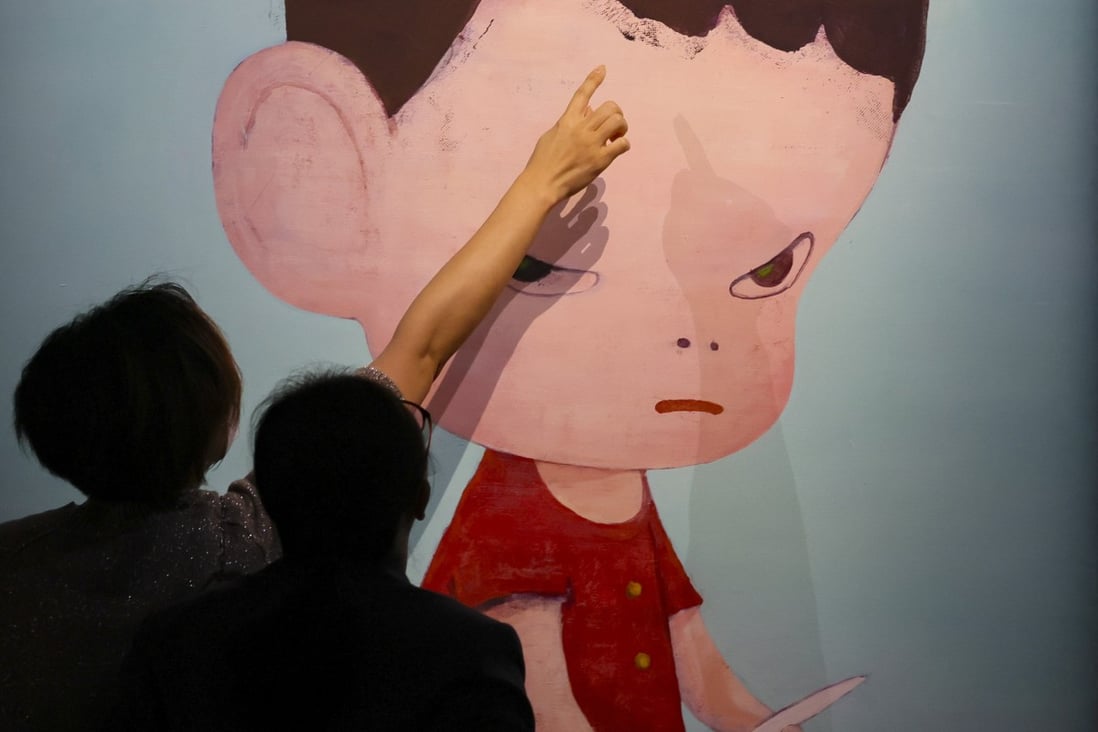 “Present” by Yoshitomo Nara is displayed prior to Christie’s autumn auctions in Hong Kong. Christie’s and Sotheby’s posted record results in 2022, buoyed by the growing ranks and spending power of Asian art collectors. Photo: Dickson Lee