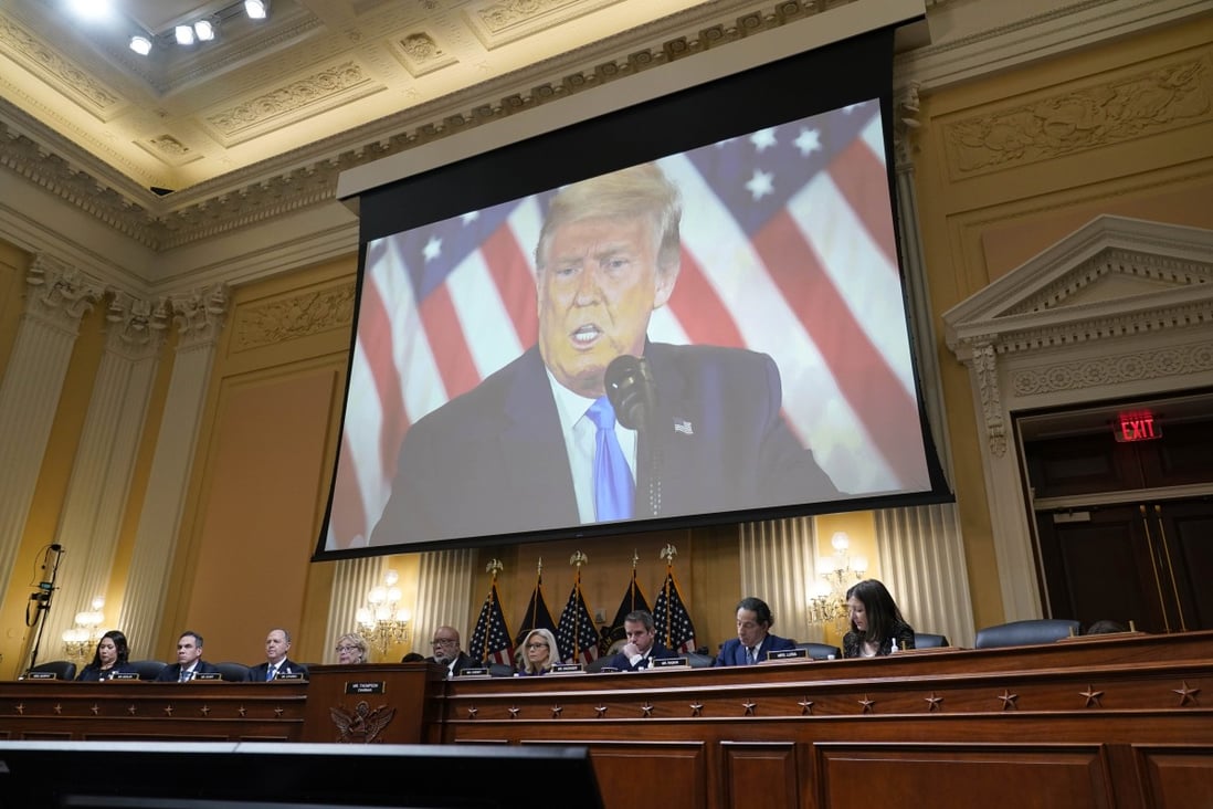 A video of former president Donald Trump is shown on a screen, as the House select committee holds its final meeting. Photo: AP