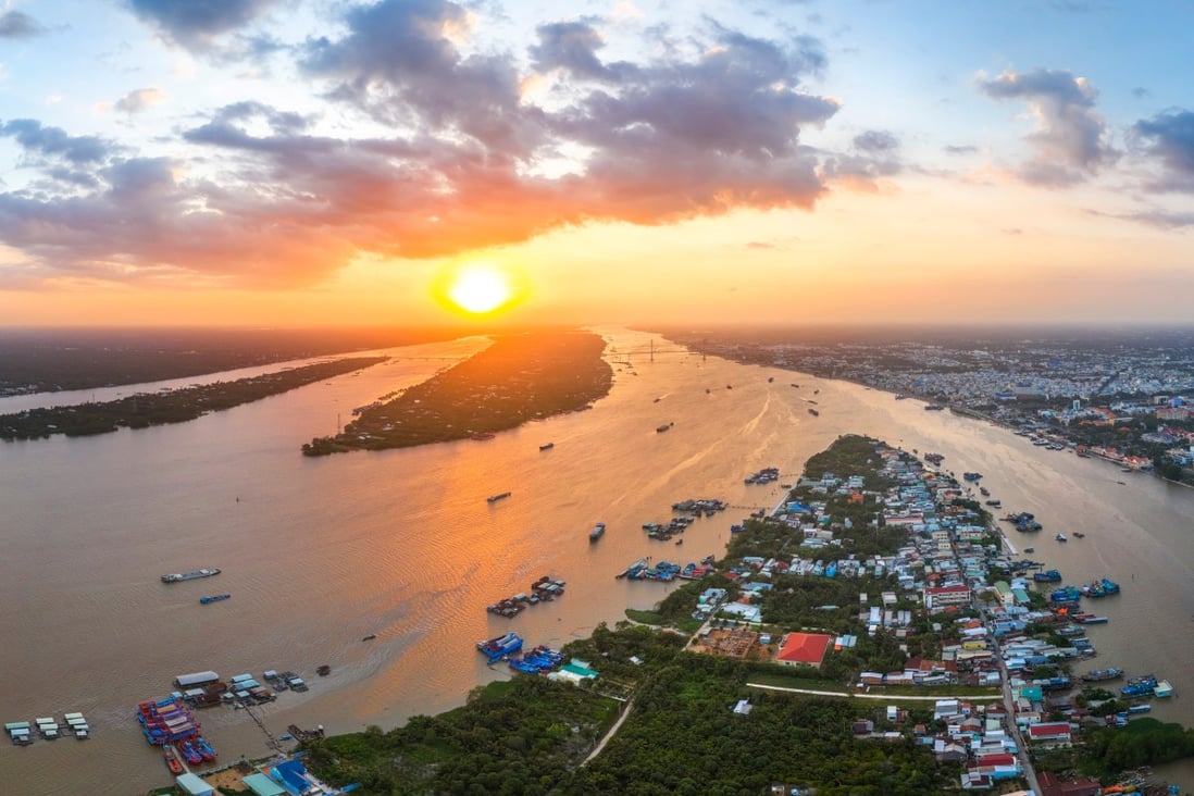 A sunset over the Mekong Delta in southern Vietnam. River sand is often used for construction in Vietnam as it can be extracted cheaply from nearby river channels and is easily transported by barge. Photo: Shutterstock