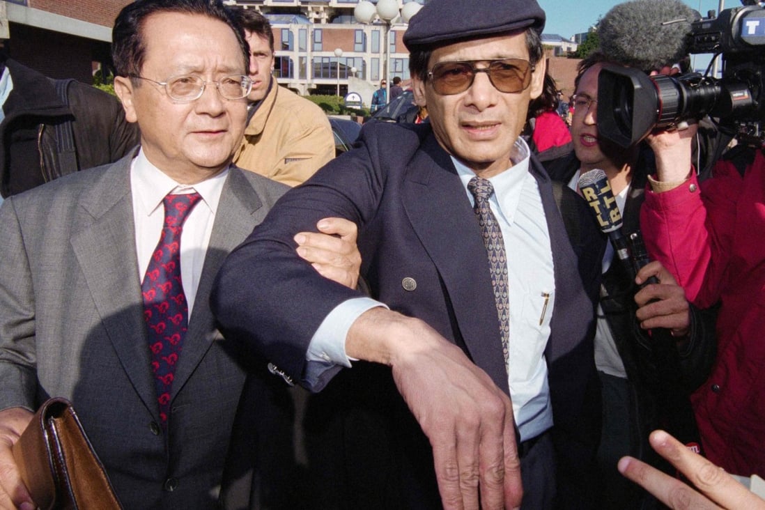 French serial killer, fraudster, and thief Charles Sobhraj, centre, leaving court in 1997. Photo: AFP