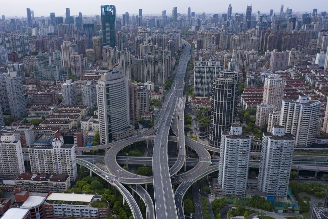 Shanghai, seen here with empty roads amid citywide lockdowns in April, plans to tap into its fiscal reserves amid a revenue shortfall. Photo: Bloomberg