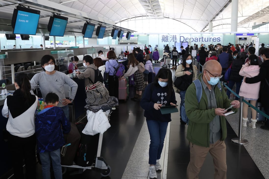 Passengers check in for their flight at the Cathay Pacific Airline Check in counter at Hong Kong International Airport. Photo: SCMP / Yik Yeung-man