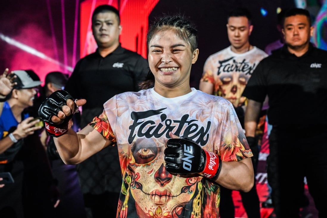 Stamp Fairtex walks to the Circle for a fight with Jihin Radzuan. Photos: ONE Championship