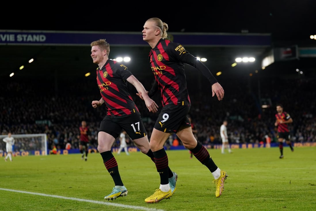 Manchester City’s Erling Haaland (right) celebrates scoring his side’s second against Leeds United with teammate Kevin De Bruyne. Photo: DPA