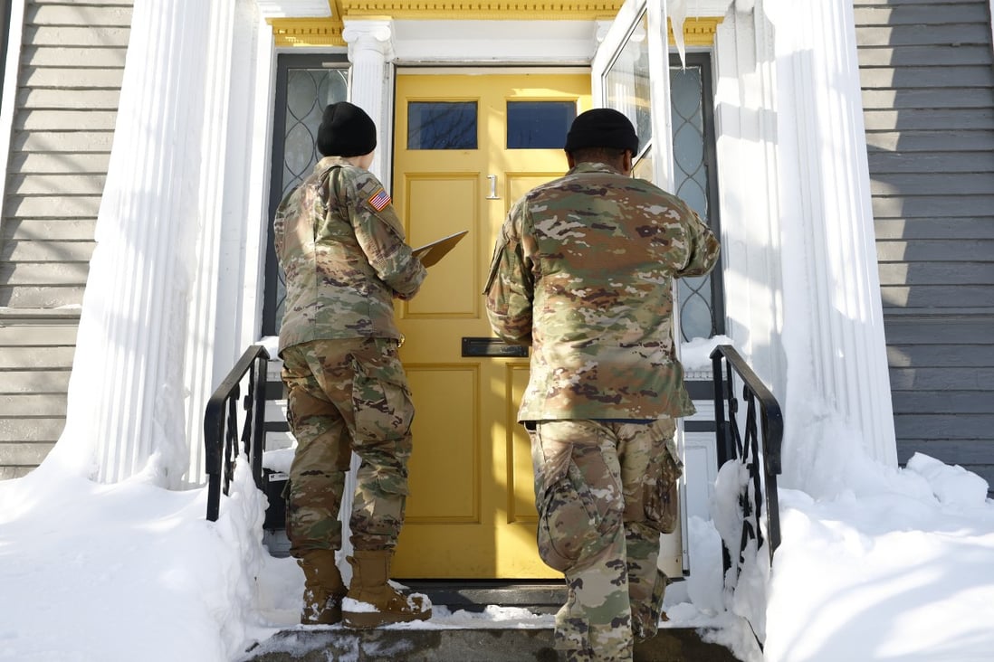 National guard members check on residents in Buffalo, New York on Wednesday following a winter storm. Photo: AP