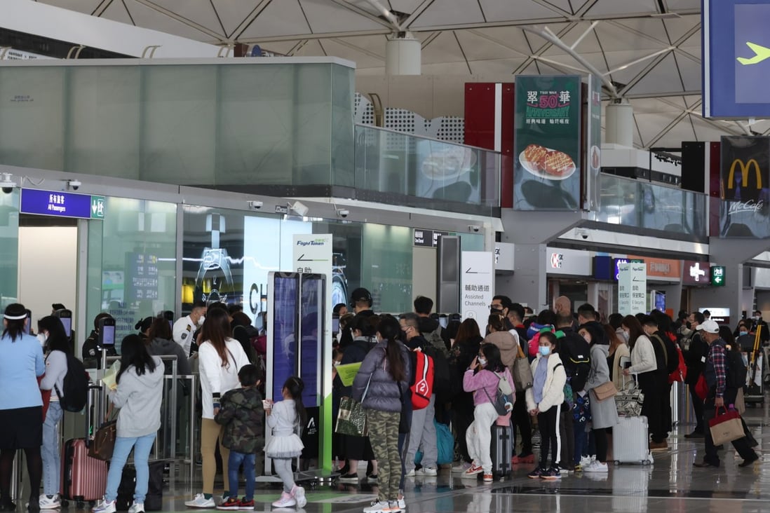 Travellers entering the departure hall at Hong Kong International Airport on the eve of Christmas. Photo: Yik Yeung-man