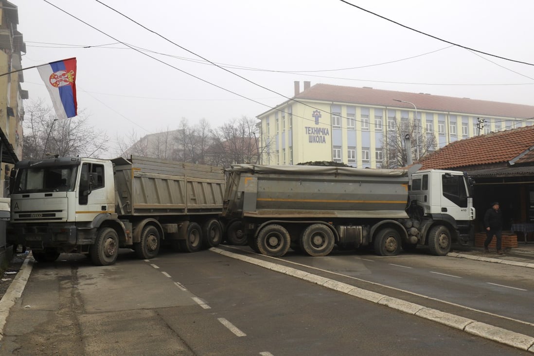 A barricade made of trucks loaded with stones in the northern, Serb-dominated part of ethnically divided town of Mitrovica, Kosovo. Photo: AP