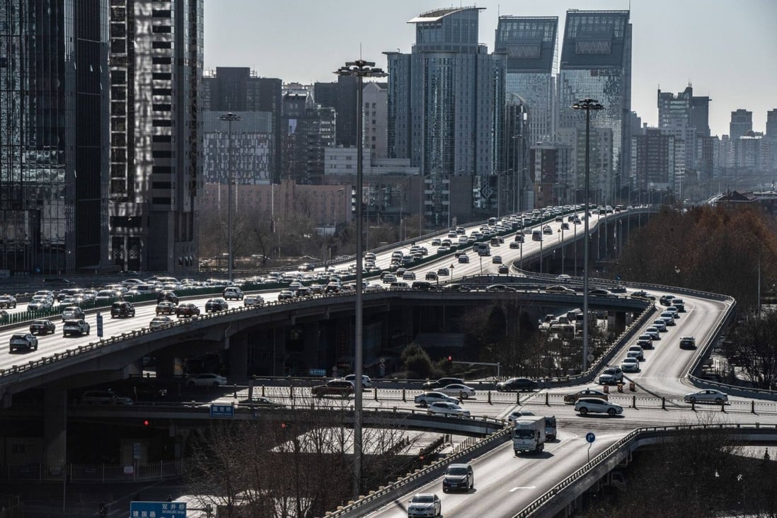 Vehicles travel along the Third Ring Road in Beijing on December 29, 2022. Photo: Bloomberg