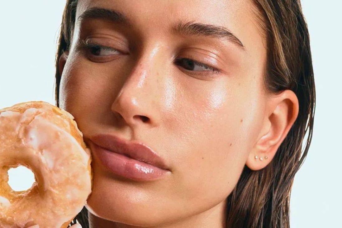 Hailey Bieber made the “glazed donut look” one of the top beauty trends of 2022.