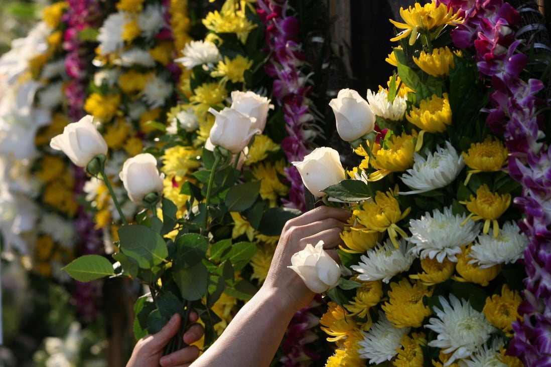 The practice of placing heavily fragranced flowers near coffins to mask the smell of decomposition has morphed into superstition. Photo: SCMP