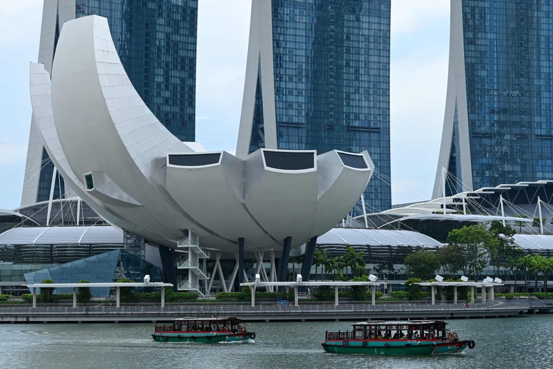 Tour boats make their way past Marina Bay Sands in Singapore. Photo: AFP