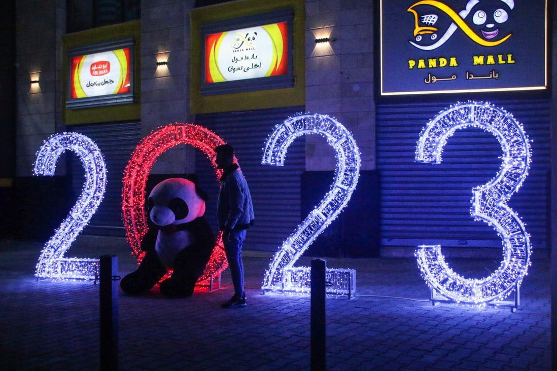 The digits of the new year glow outside the Panda Mall in Palestine. Photo: dpa