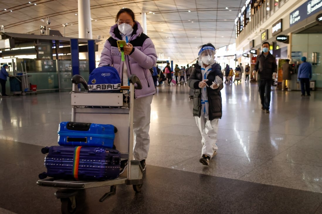 Passengers inside the Beijing Capital International Airport on Sunday. China is due to reopen its borders on January 8. Photo: EPA-EFE