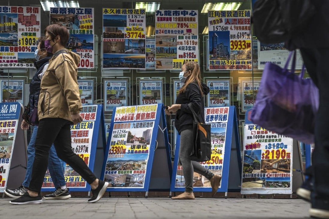 Listings for residential properties for sale at a real estate agency in Hong Kong on December 5. Photo: Bloomberg