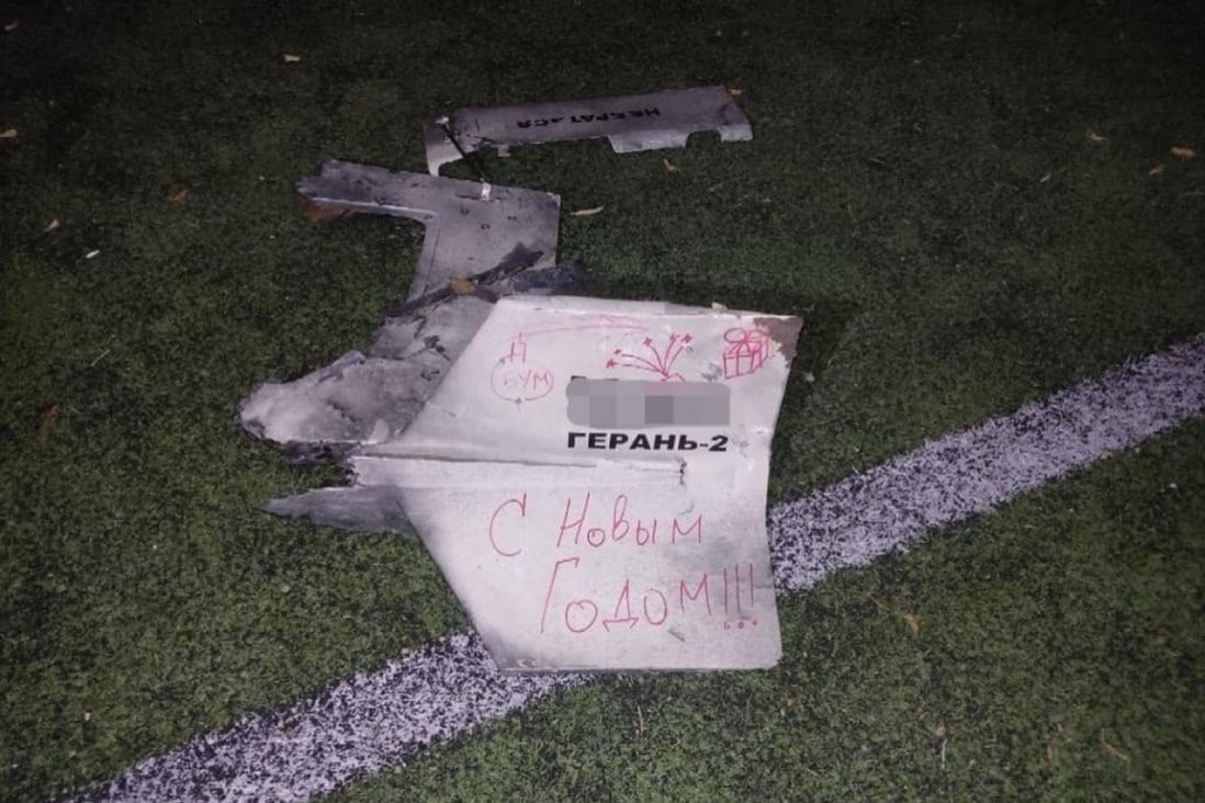 A piece of a drone used in an attack on Ukraine’s capital, with a handwritten sign on it in Russian reading ‘Happy New Year’. Photo: Facebook