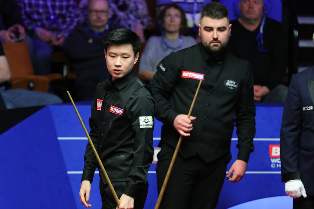 China’s Zhao Xintong (left) has been suspended as part of the World Snooker Tour’s investigation into match fixing. Photo: Xinhua
