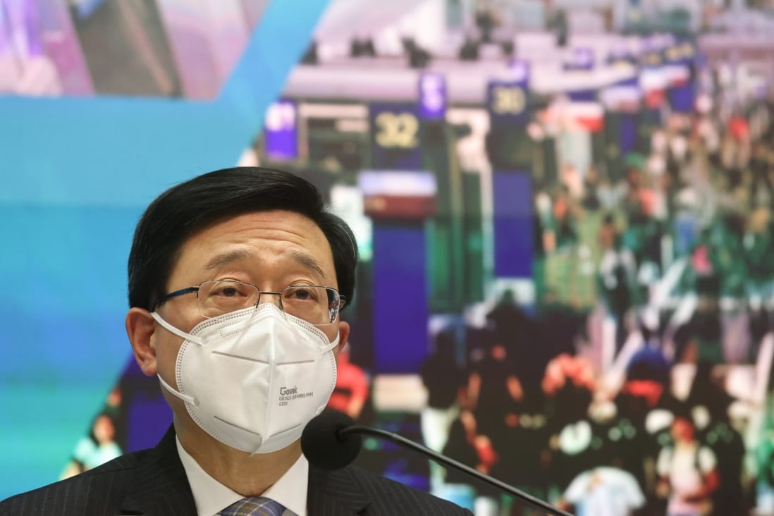Chief Executive John Lee Ka-chiu announces the reopening of the Hong Kong-mainland border on January 5. Photo: K.Y. Cheng