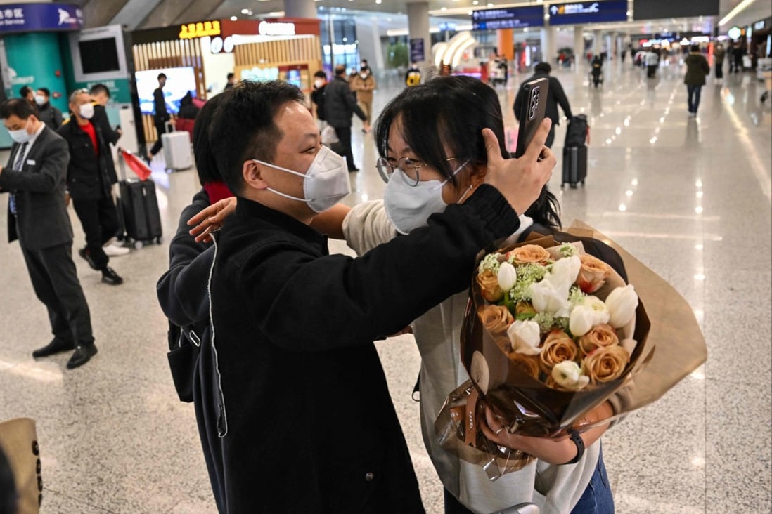 Joy at the arrivals area of Shanghai Pudong International Airport as China scraps quarantine requirements on January 8. Photo: AFP
