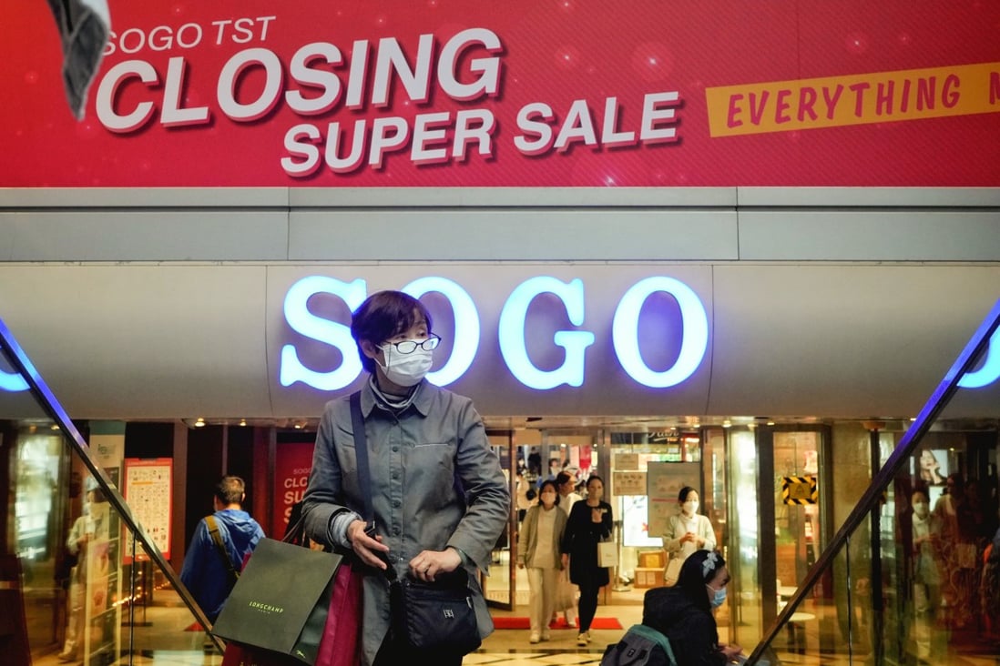 A shopper departs Sogo’s Tsim Sha Tsui department store on January 9, 2023. Photo: Elson Li