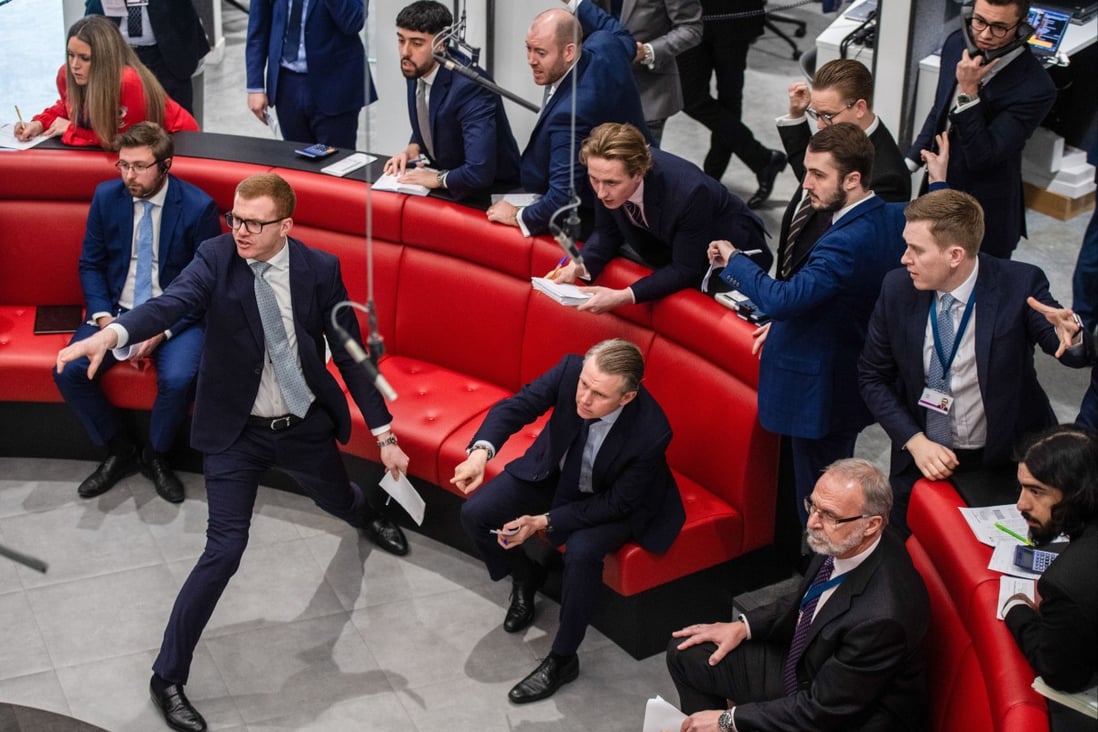 Traders in the open outcry pit of the London Metal Exchange in London in February 2022. Photo: Bloomberg
