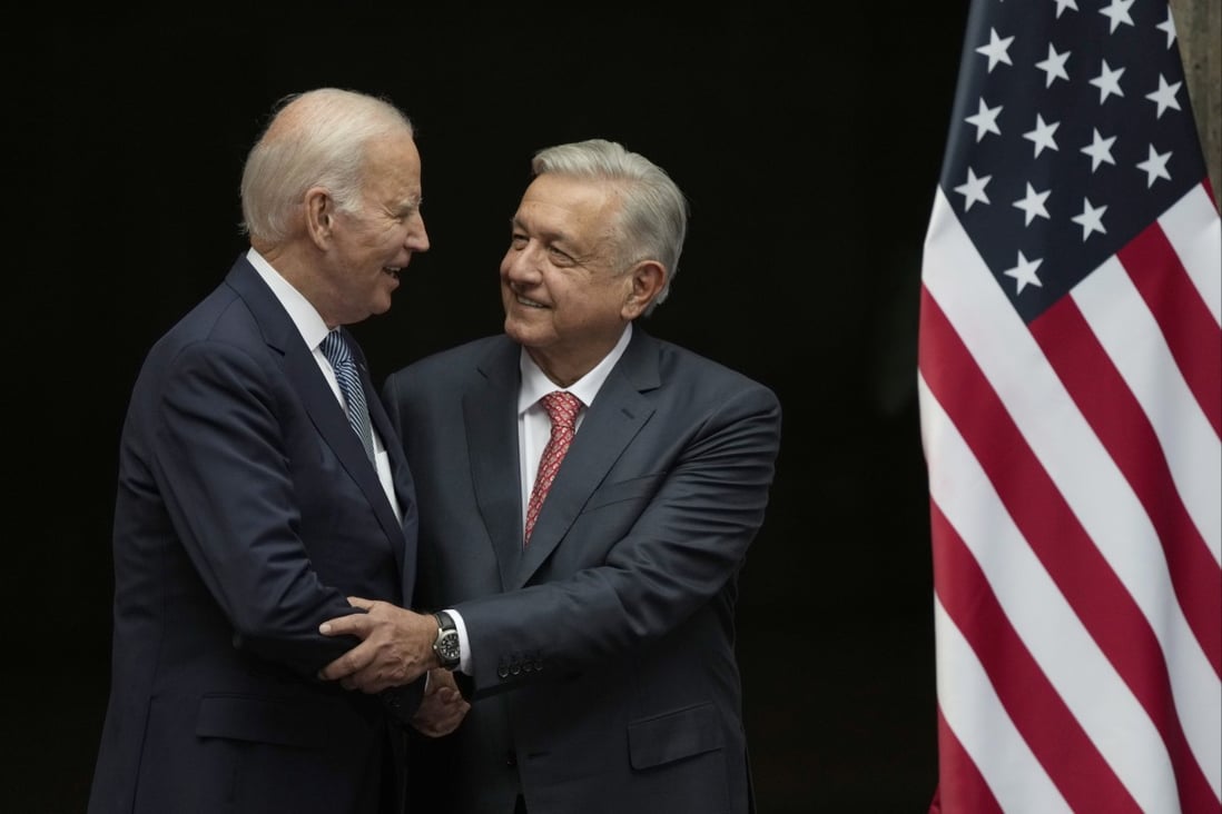Mexico’s President Andres Manuel Lopez Obrador and US President Joe Biden embrace at the National Palace in Mexico City, Mexico on Monday. Photo: AP