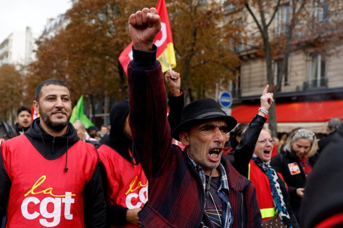 Protesters and French CGT labour union workers in Paris take part in a nationwide day of strike and rallies to push for government measures to address inflation, workers’ rights and pension reforms in September 2022. Photo: Reuters