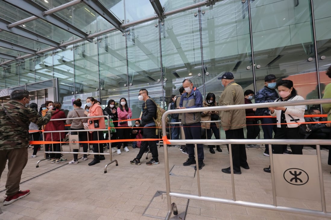 People queue up outside the West Kowloon terminus on Thursday to buy rail tickets. Photo: Jelly Tse