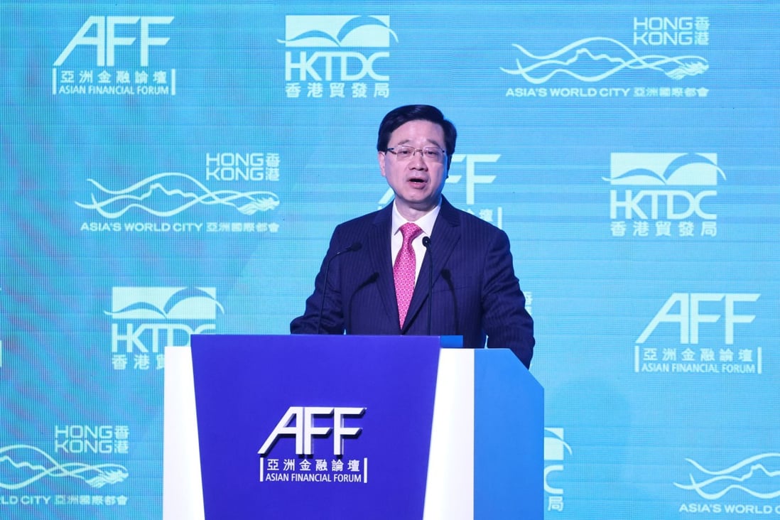 Chief Executive John Lee speaks at the Asian Financial Forum at the Hong Kong Convention and Exhibition Centre in Wan Chai on January 11. Lee promised to “go fast” on the city’s return to normal. Photo: K.Y. Cheng