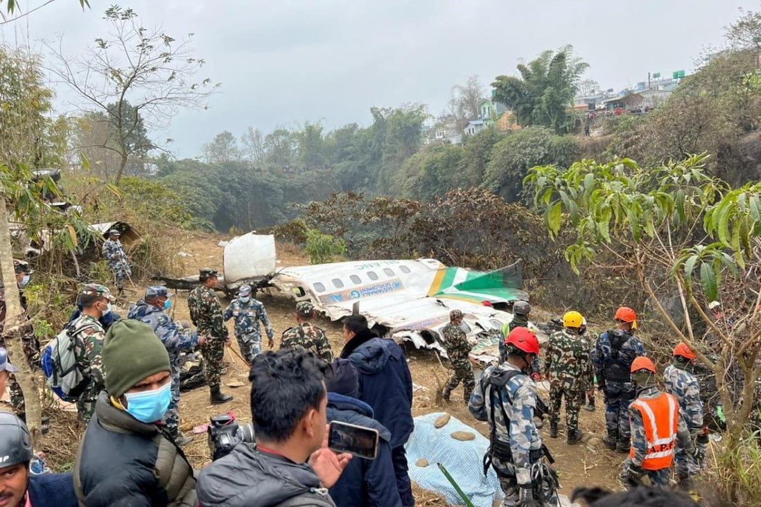 Rescue teams work to retrieve bodies from the wreckage of the crash of a Yeti Airlines aircraft, in Pokhara, Nepal on Monday. Photo: Reuters