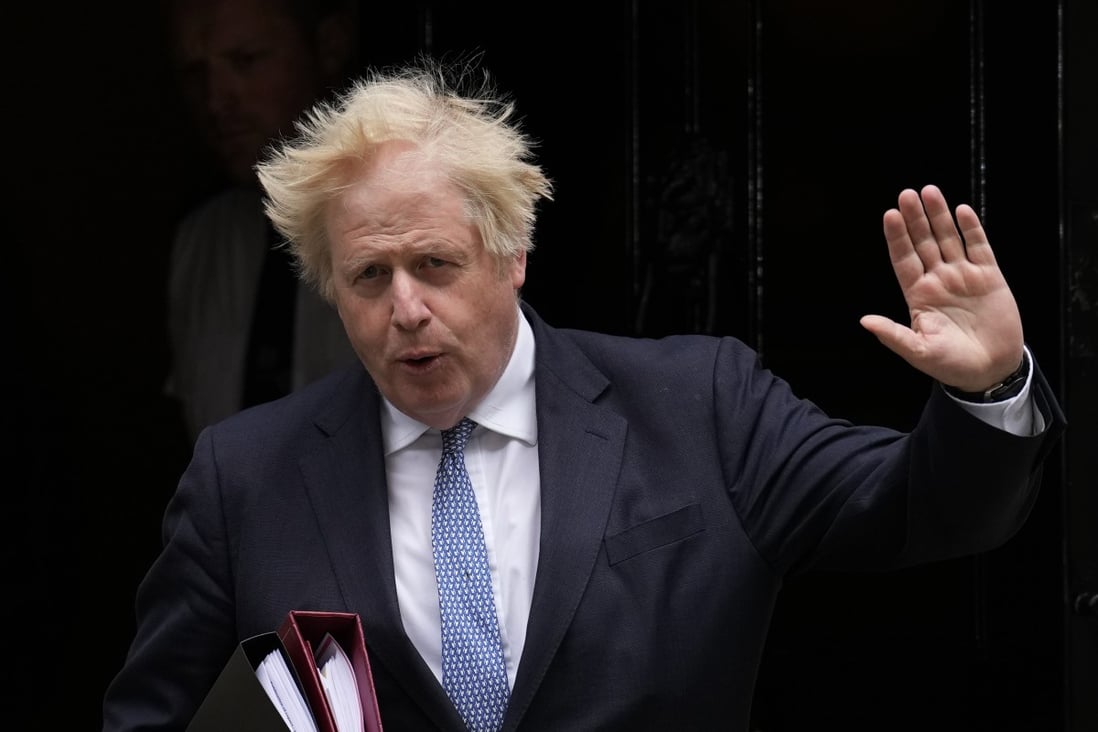 Boris Johnson leaves 10 Downing Street to attend the weekly Prime Minister’s Questions in London in May 2022. Photo: AP
