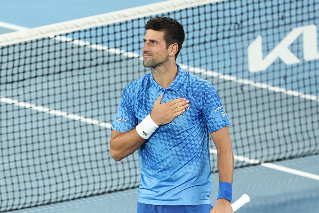 Novak Djokovic celebrates after winning against Roberto Carballes Baena on day two of the 2023 Australian Open. Photo: AFP via Getty Images