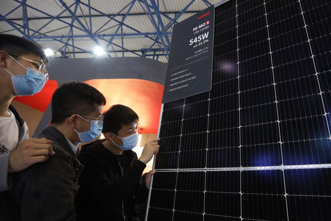 Long’s Hi-MO5 bifacial modules are displayed at the Clean Energy Expo in Beijing, in April 2021. Photo: Simon Song