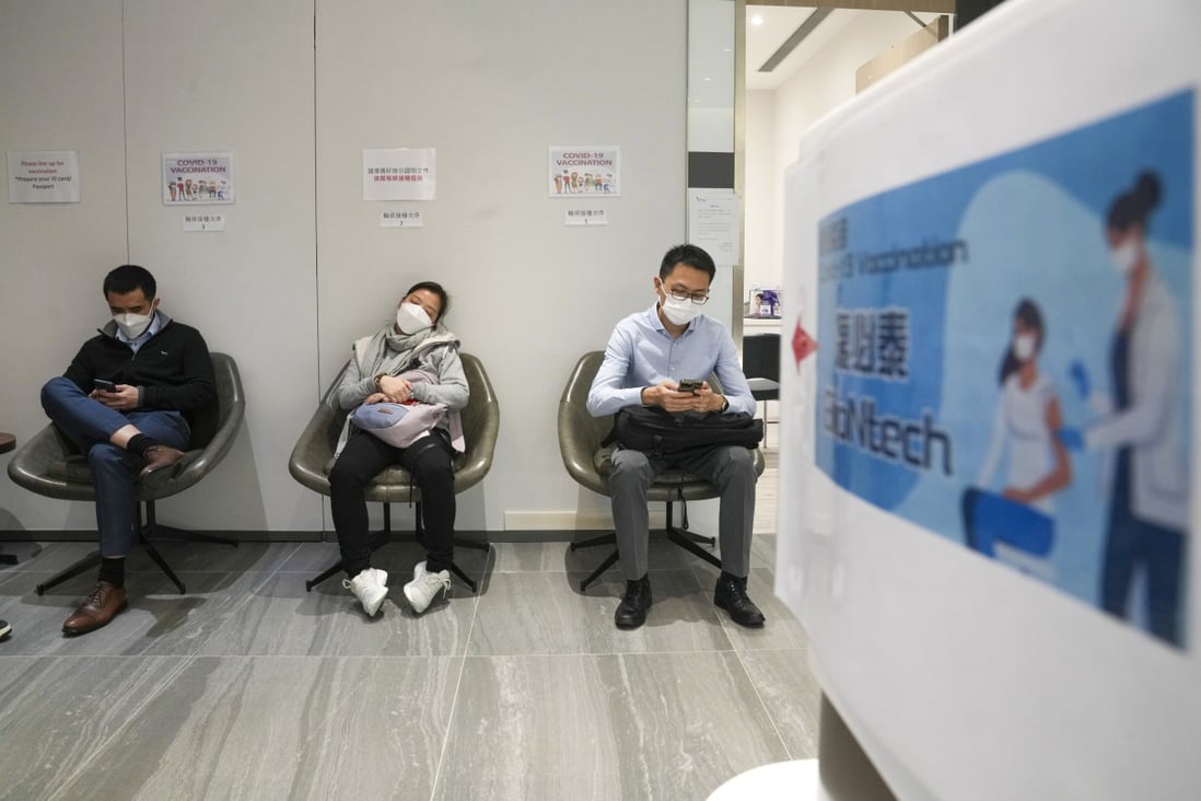 Residents in line to get vaccinated in Tsim Sha Tsui. Photo: Sam Tsang