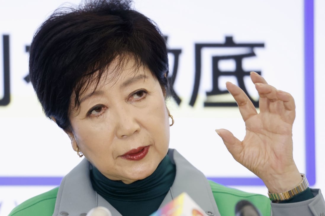 Tokyo Governor Yuriko Koike speaks at a press conference while wearing a polo neck jumper. Photo: Kyodo