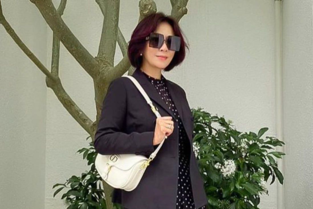 Carina Lau is pictured here with a Dior Bobby, but her luxury handbag collection extends from Hermès Kelly and Louis Vuitton Petite Malle to Bulgari Serpenti Forever. Photo: @carinalau1208/Instagram