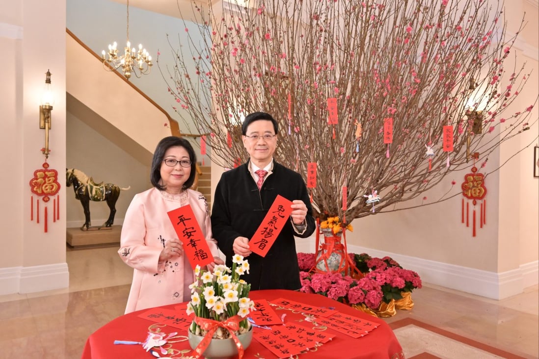 Hong Kong Chief Executive John Lee with his wife, filmed decorating their home. Photo: Handout