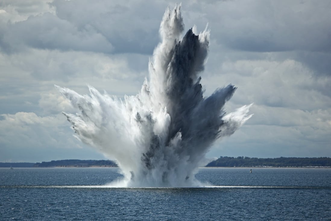 Huge Water Fountain caused by  below surface explosion of a sea mine in the ocean. Photo: Shutterstock/File