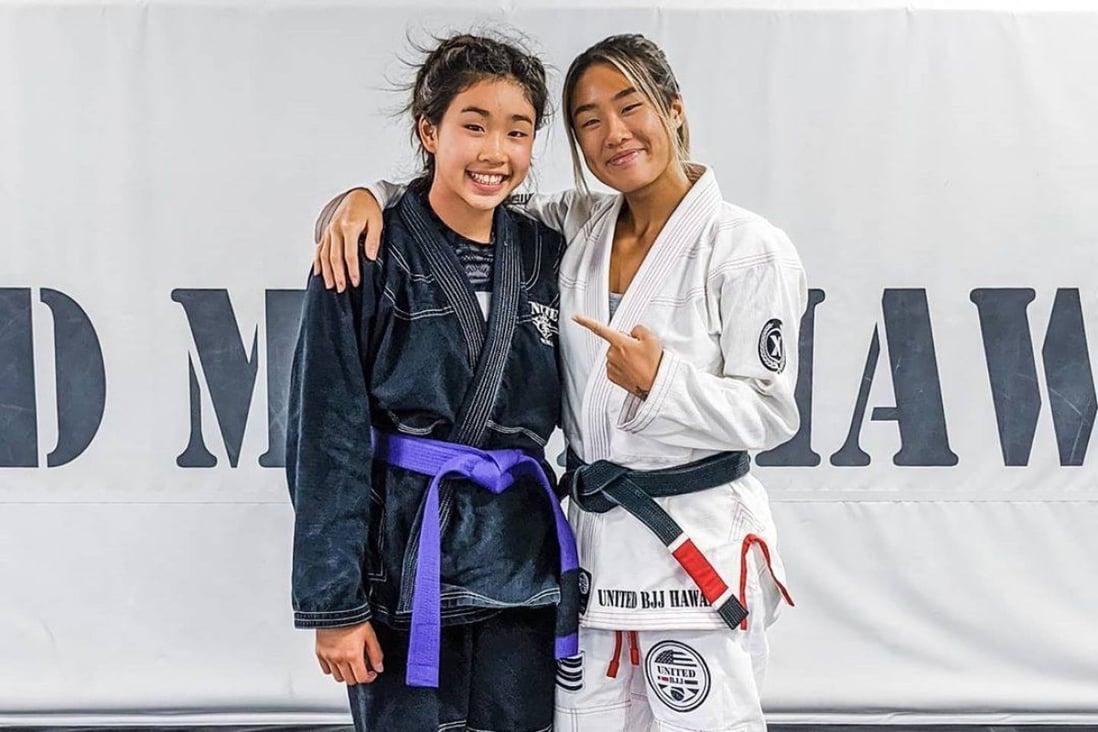 ONE Championship’s Angela Lee (right) with her younger sister Victoria Lee at their family’s United MMA gym in Hawaii. Photo: Instagram