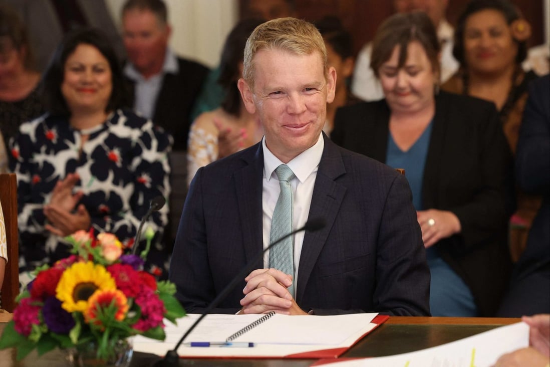 New Zealand’s new Prime Minister Chris Hipkins smiles as he is sworn in by Governor General Dame Cindy Kiro during a ceremony at The Government House in Wellington on Wednesday. Photo: AFP