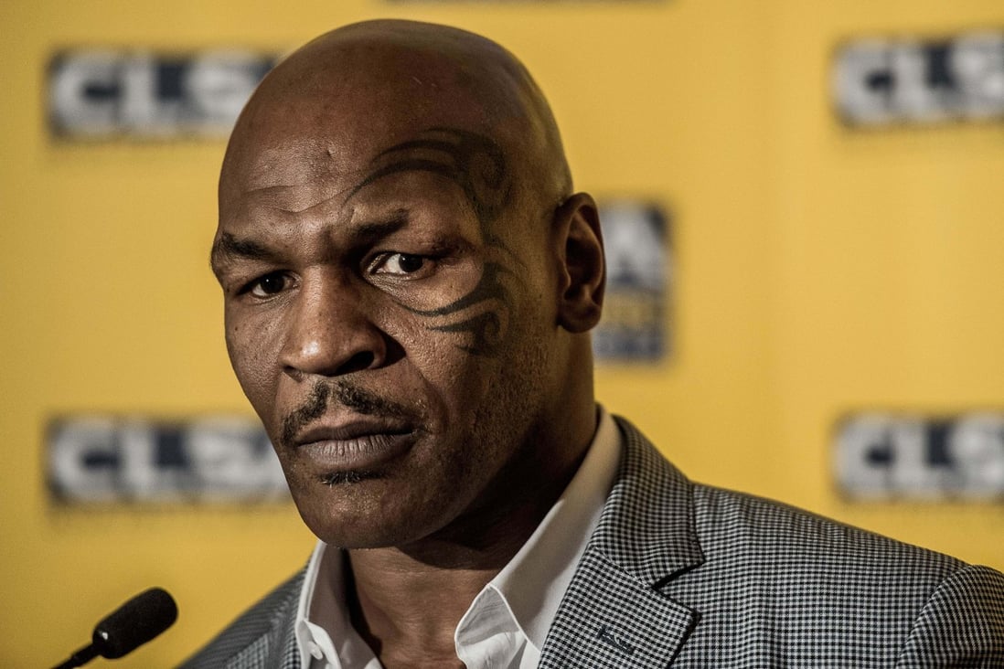 US boxer and former heavyweight world champion Mike Tyson speaks at a press conference in Hong Kong in September 2012. Photo: AFP