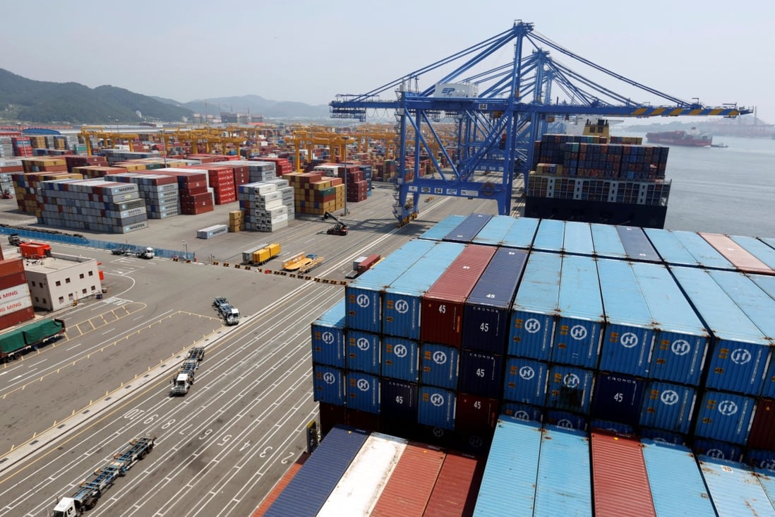 Trucks used to transport containers are seen at the Hanjin Shipping container terminal at the Busan New Port in Busan, South Korea. Photo: Reuters