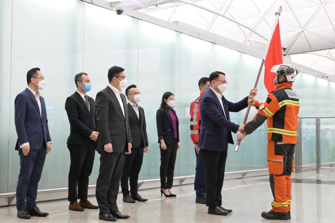 Acting chief executive Eric Chan sees the search and rescue team off at Hong Kong International Airport on Wednesday night. Photo: Handout 