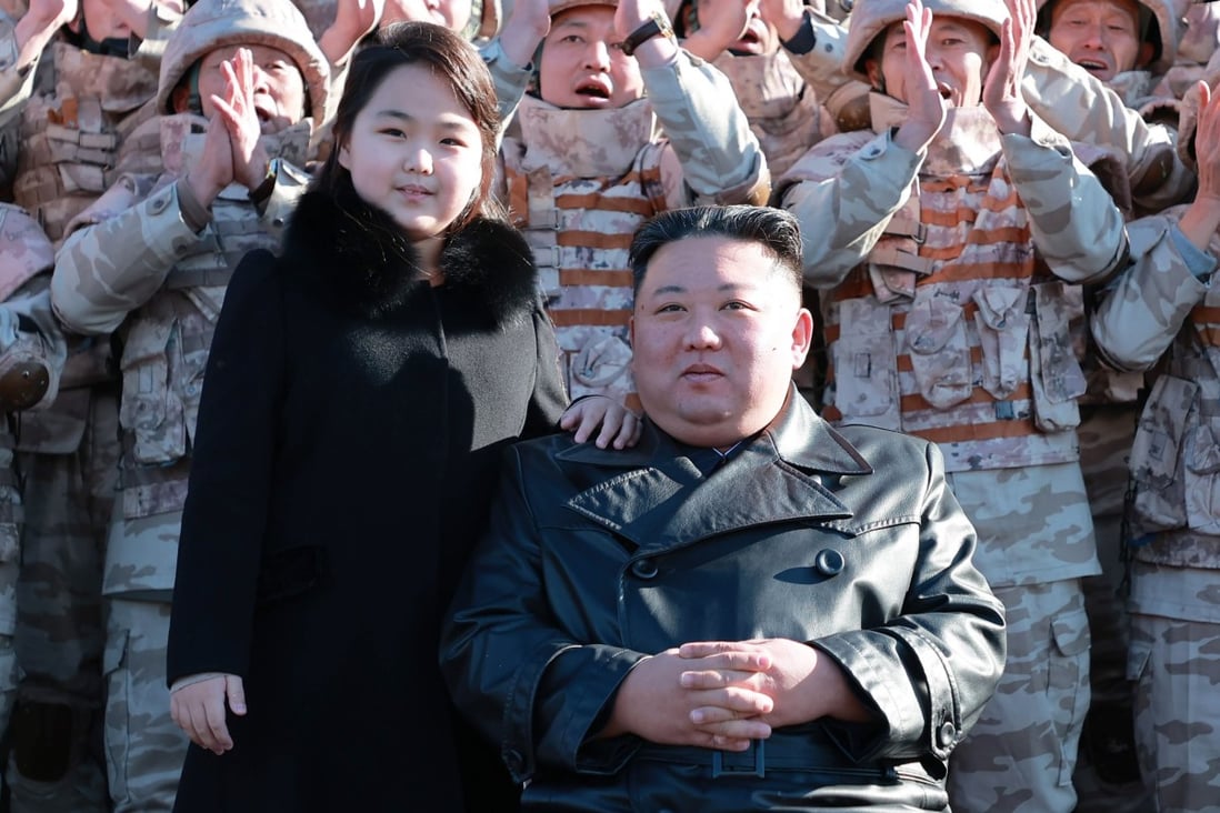 North Korean leader Kim Jong-un (front, C) posing with his daughter, presumed to be his second child, Ju-ae (C-L), during a test-firing of new-type ICBM Hwasongpho-17 at an undisclosed location in North Korea. Photo: EPA-EFE/KCNA/File