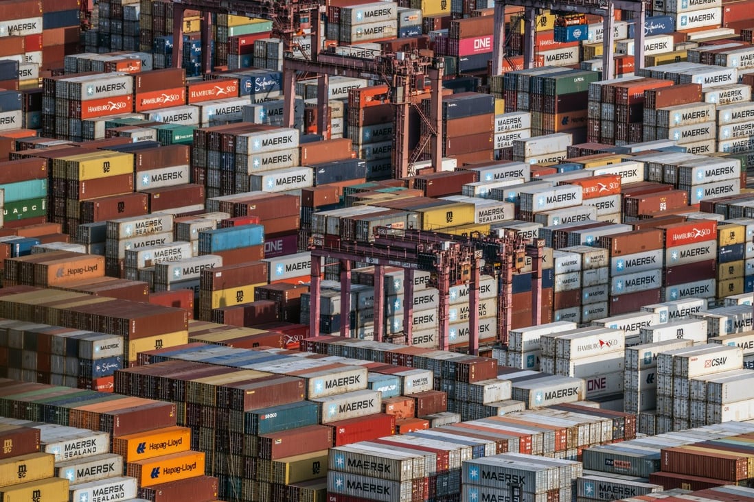 Shipping containers and gantry cranes are pictured at the Kwai Tsing Container Terminal in Hong Kong on March 14, 2022. Photo: Bloomberg