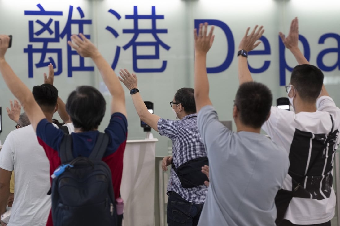 Friends and family wave goodbye to travellers at the Hong Kong International Airport. Photo: Robert Ng