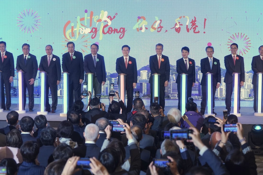 Chief Executive John Lee Ka-chiu (centre) is joined by government officials and heads of tourism bodies at the “Hello Hong Kong” campaign launch ceremony on February 2. Photo: Elson Li