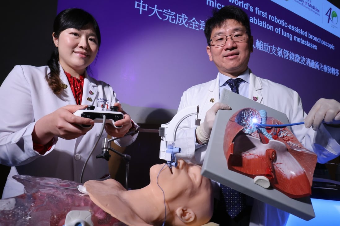 Dr Rainbow Lau Wing-hung (left) and Professor Calvin Ng Sze-hang explain the Chinese University of Hong Kong’s new procedure for cancer patients. Photo: May Tse