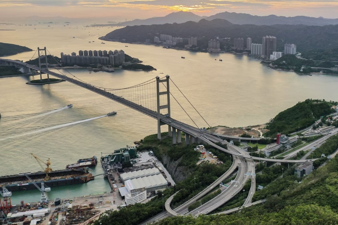 A view of Hutchison United Dockyard Limited’s land (left of the bridge) and the government’s idle plot (right of the bridge) in Tsing Yi on 10 Mar 2023. Photo: Martin Chan.