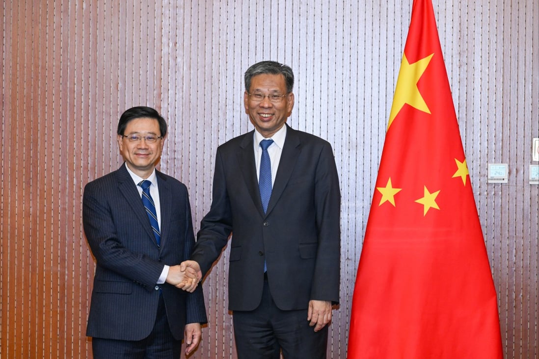 Chief Executive John Lee (left) meets Minister of Finance Liu Kun during his trip to Beijing. Photo: Handout