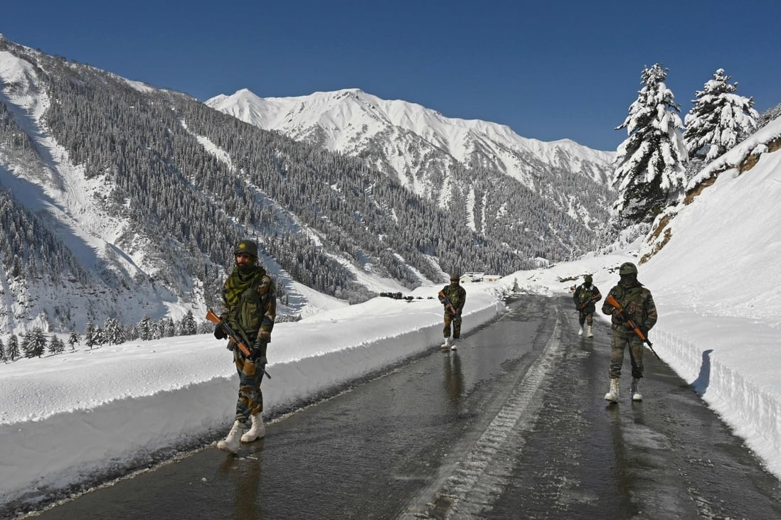 Indian army soldiers guard a road leading to the Ladakh region in February 2021. Photo: AFP